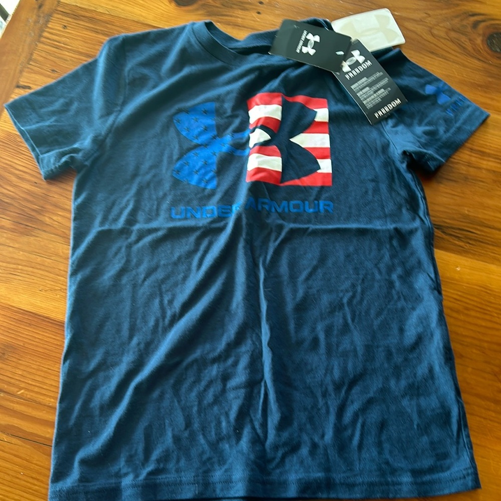 Boys Medium UA shirt. NEW!